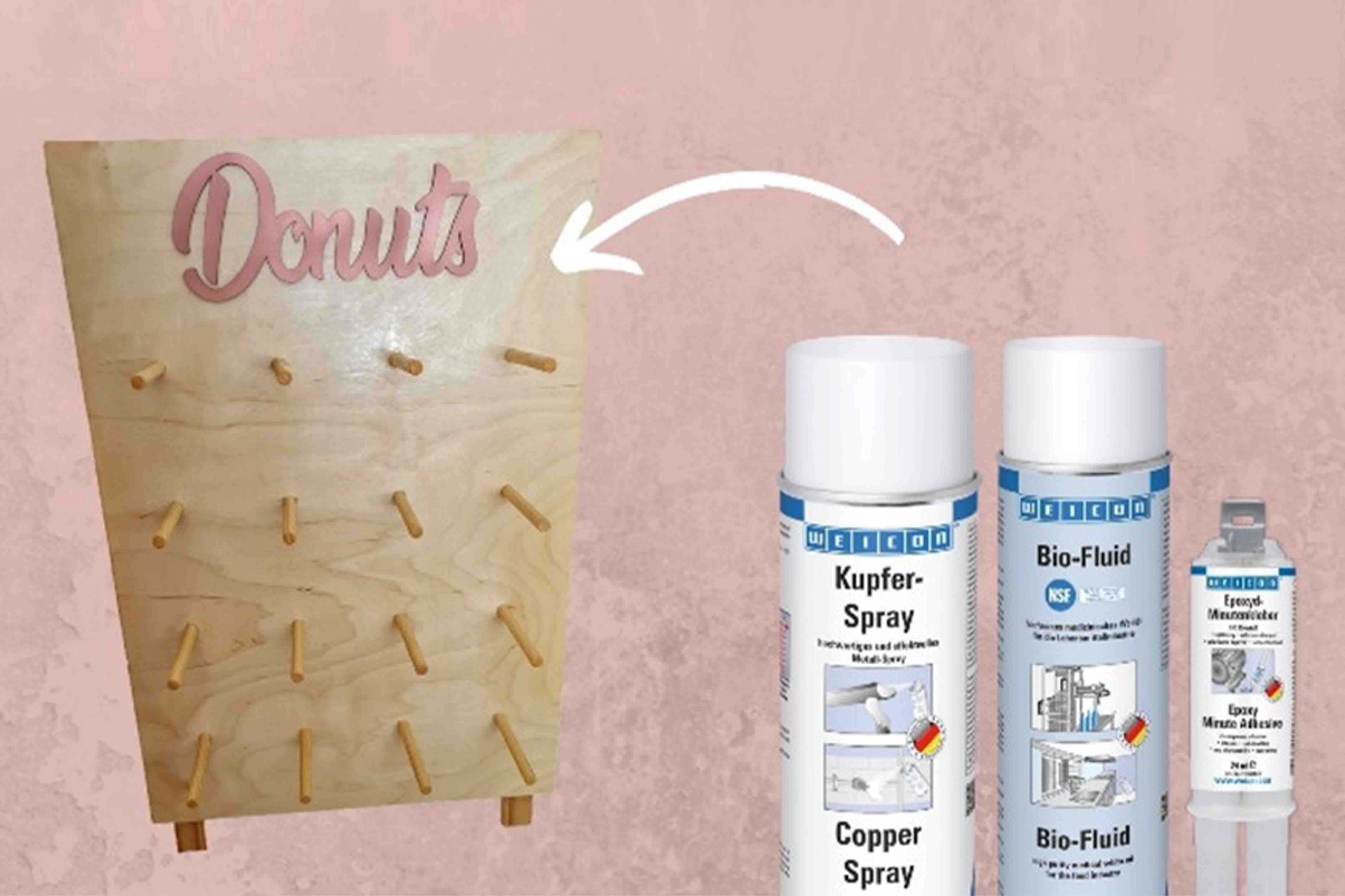 donuts, wooden panel, pink background, spray cans, adhesive bottle, donuts, wood board, pink background, spray cans, copper spray