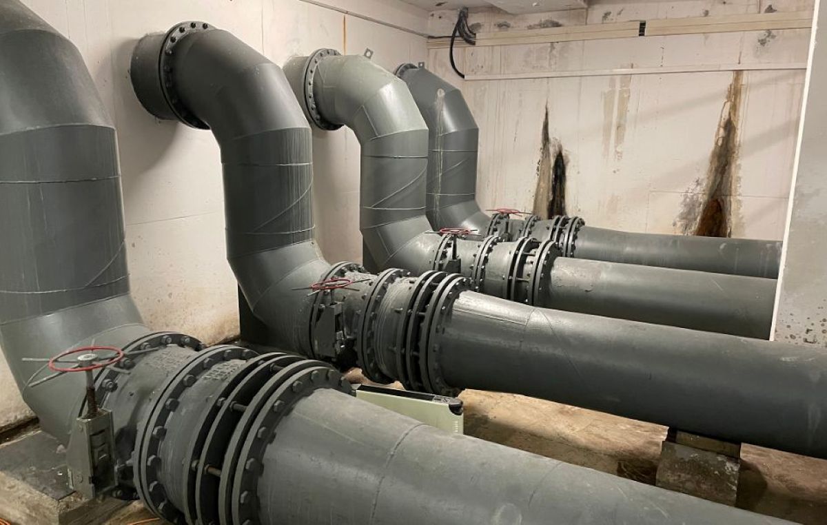 industrial pipes, gray PVC, flanged joints, pipe elbows, handwheel valves