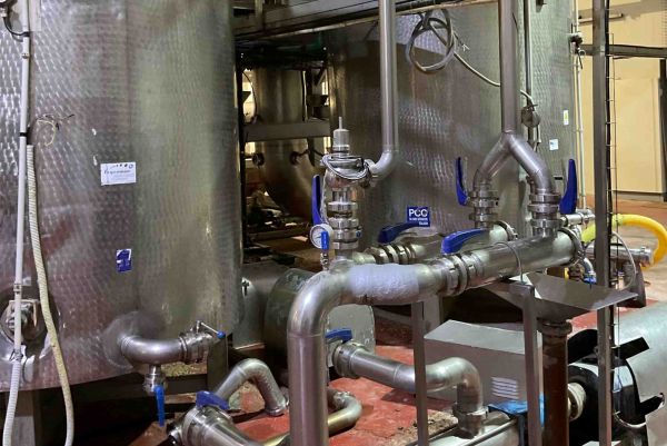 industrial equipment, pipes, valves, tanks, factory setting