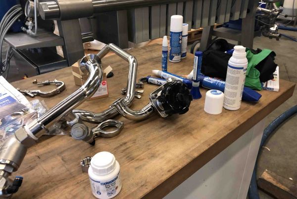 industrial tubing, metal fittings, chrome pipe, valve assembly, lubricant bottle