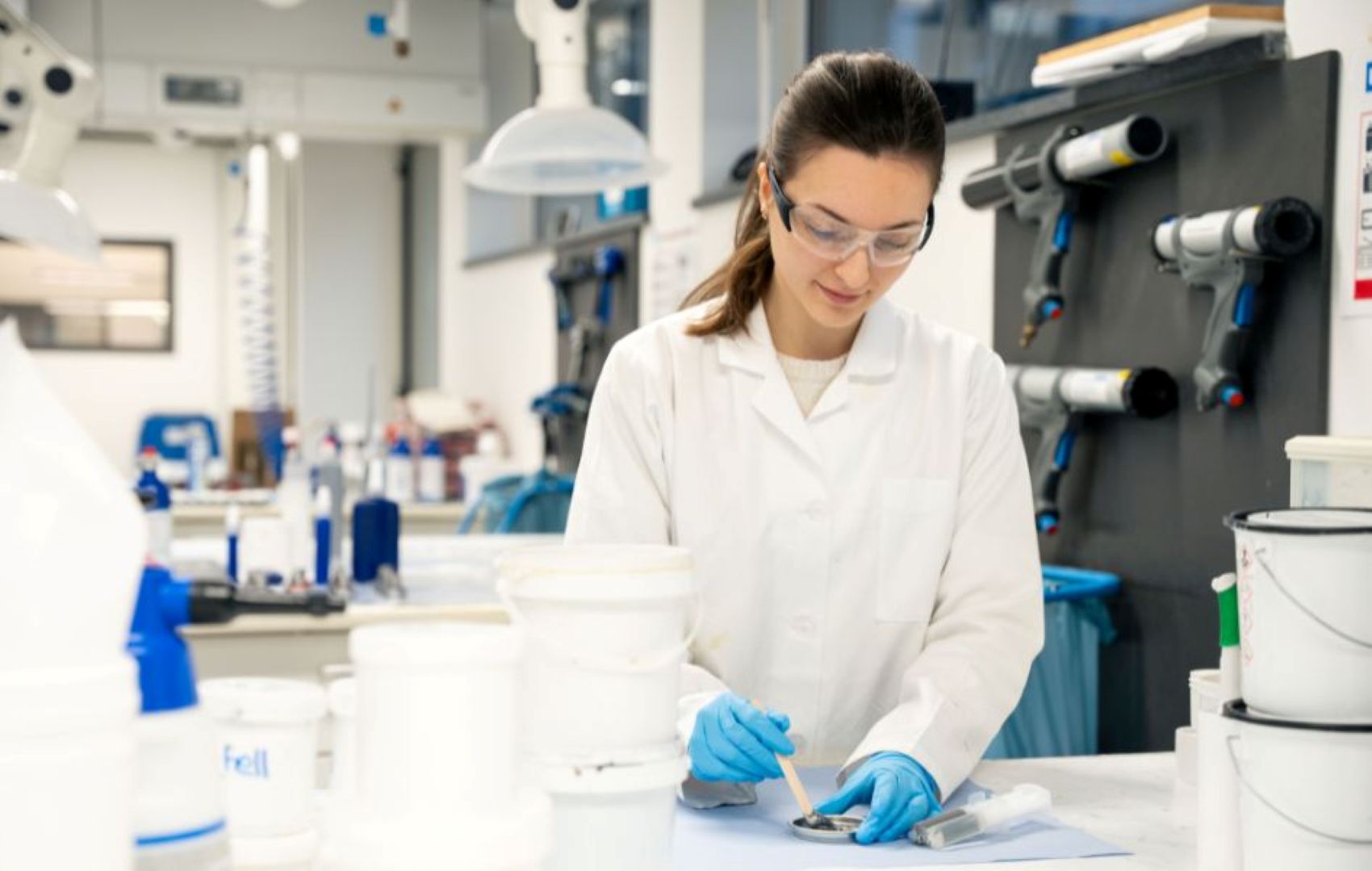 Lab coat, Safety goggles, Blue gloves, Protective clothing, Laboratory